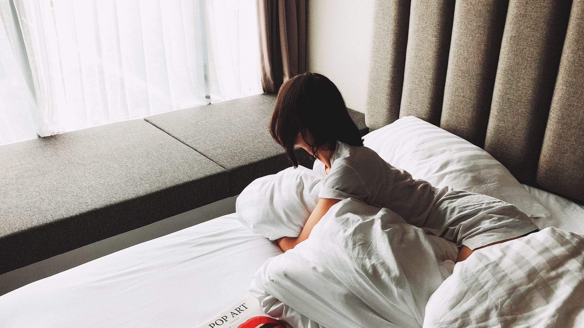 Reading in bed at PULANG ke UTTARA